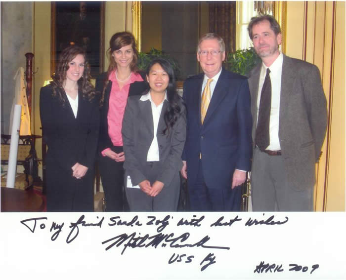 sanda zolj polaroid of sanda zolj standing with senator mitch mcconnell and colleagues
