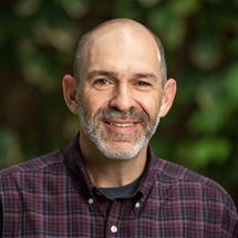 Bellarmine University professor Dr. Brad Stevenson poses for a portrait.