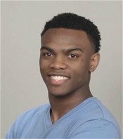 Bellarmine University student Edwin White poses for a photograph.