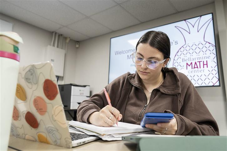 A Bellarmine University student works in the Math Center.