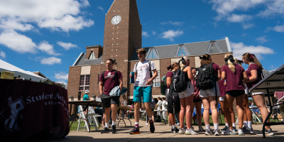 students walk through the quad