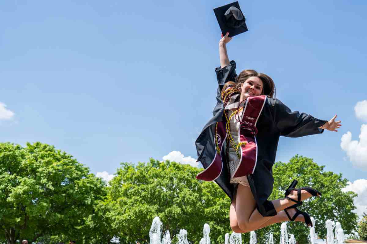 a person wearing graduation regalia 