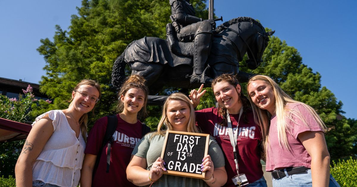 a group of students smiling 