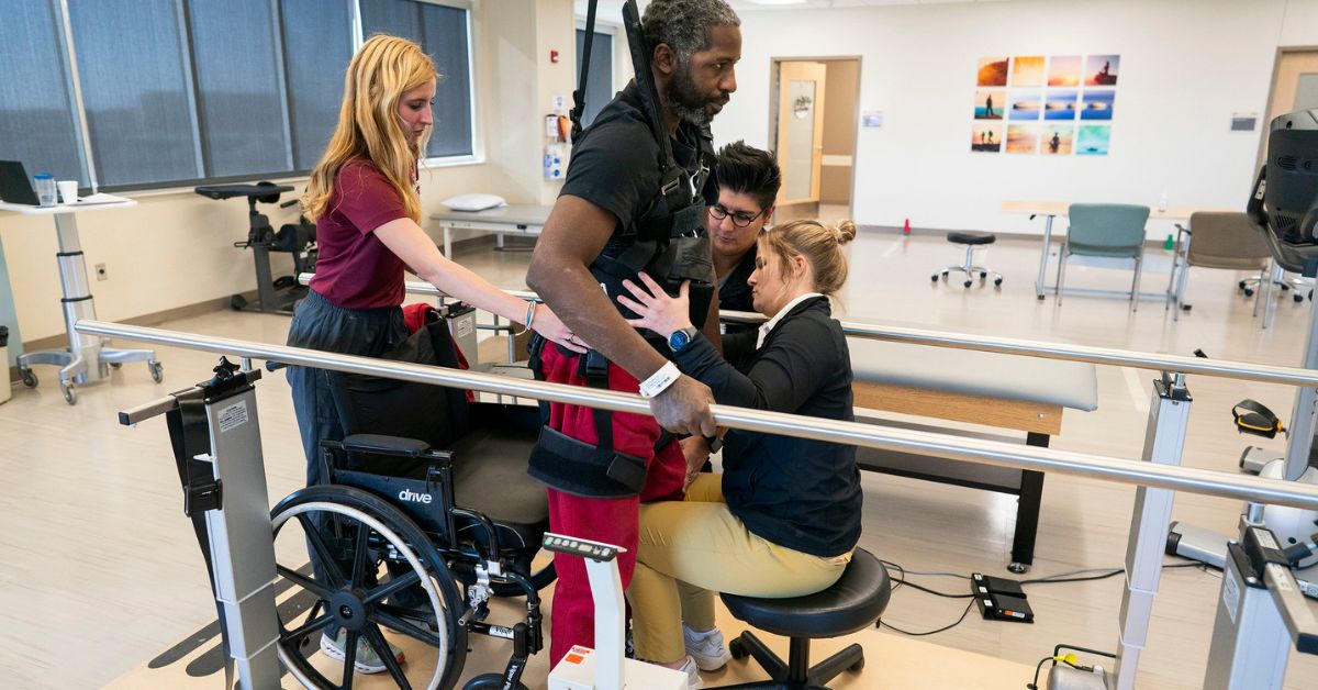 PT students working with a patient