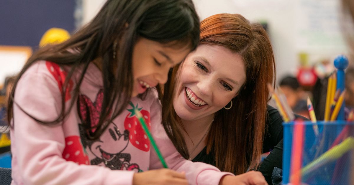 Teacher and student in a classroom