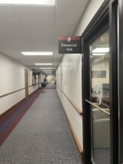 FinAid Hallway with a sign for the Financial Aid Office