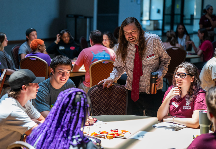 Students and Staff Sitting Around a Table