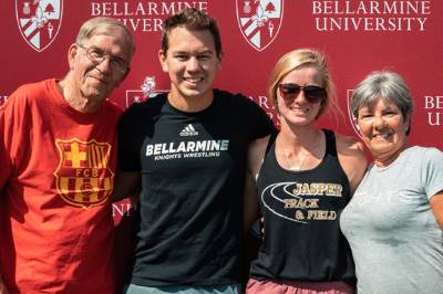 Family poses for a photo at a parents' event