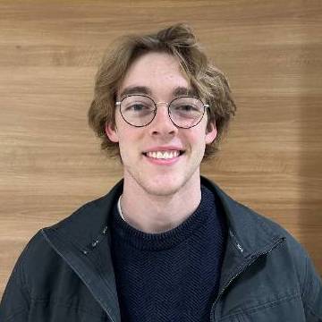 Bellarmine Business Administration student Owen Bates poses for a portrait.