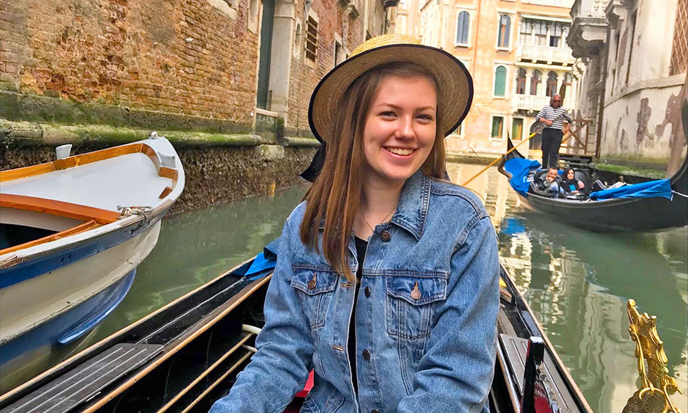 Student enjoys a study abroad experience in a gondola