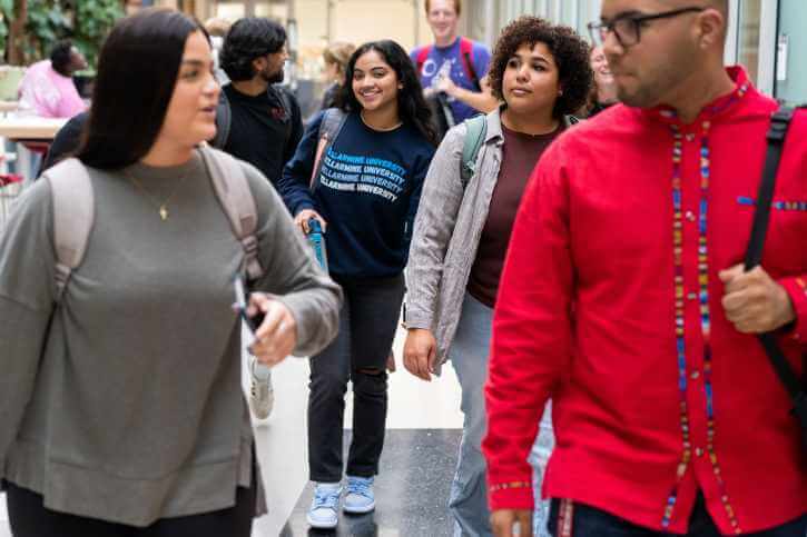 Bellarmine students chat while changing classes in Centro.