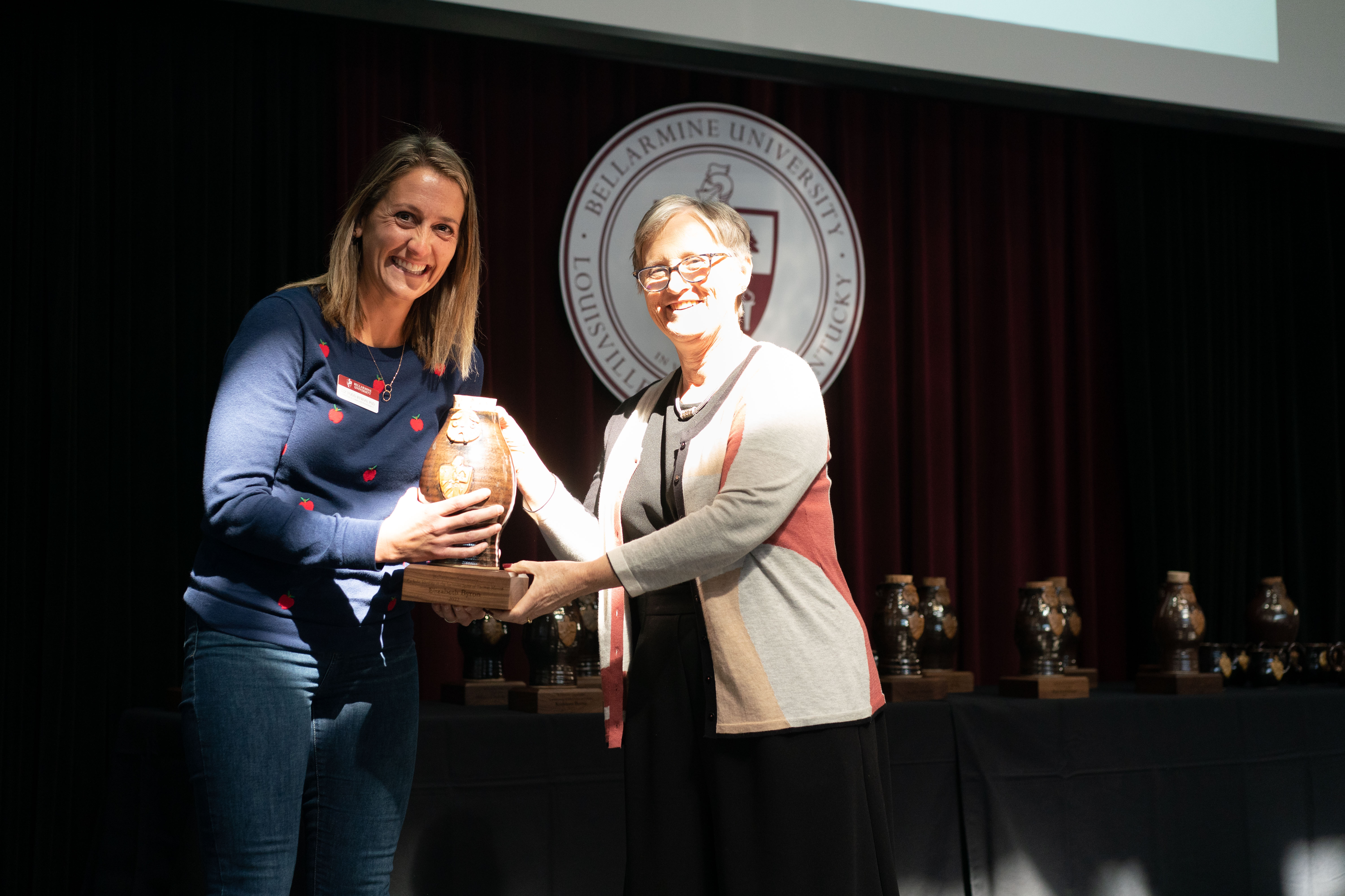 Dr. Liz Byron receives Catholic Identity In the Inclusive Spirit of Thomas Merton Award.