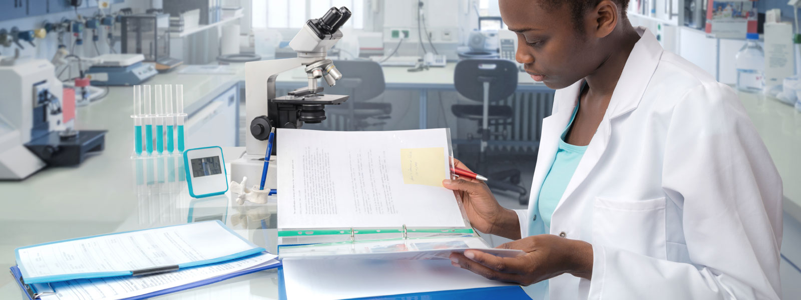 Student looking in microscope