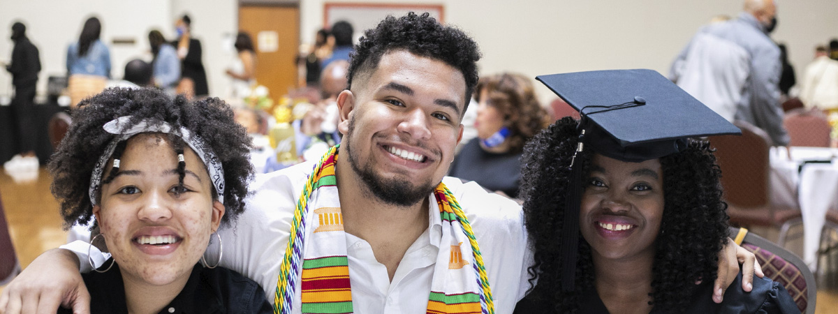 Students pose at a graduation award dinner