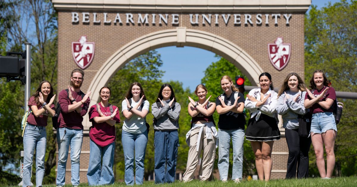 BU students in front of arch